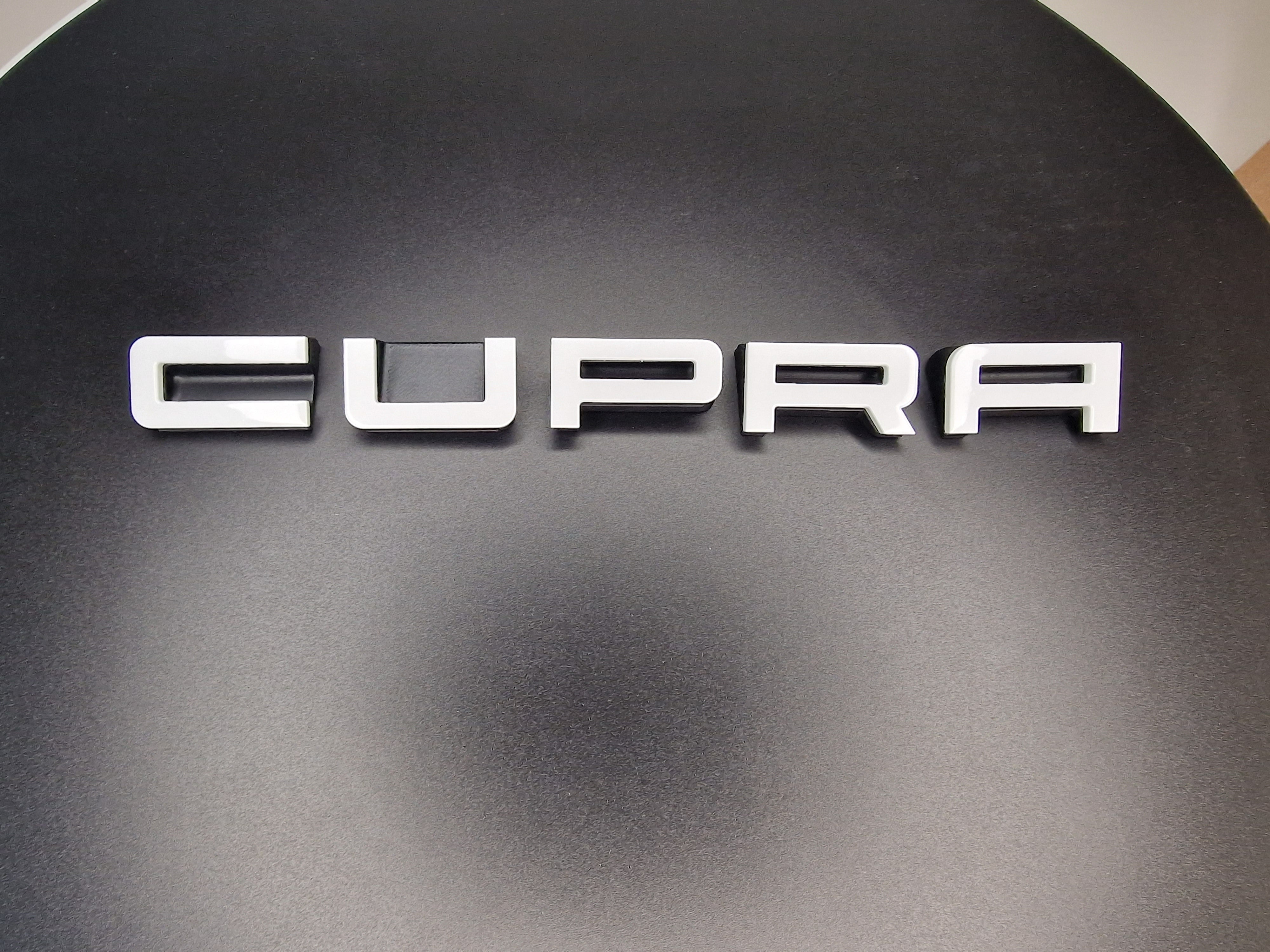 Cupra lettering for the Cupra Formentor in copper