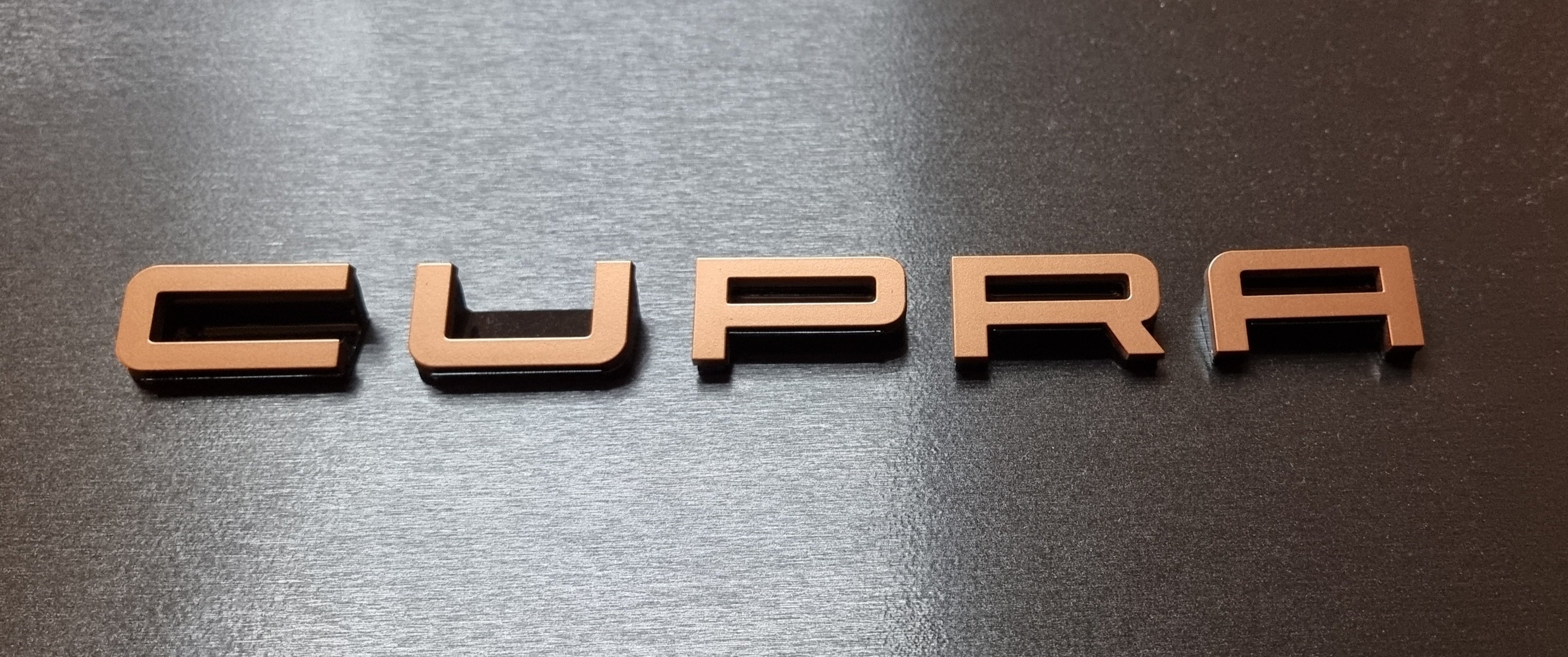 Cupra lettering for the Cupra Formentor in copper